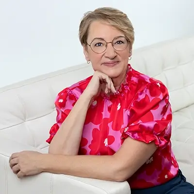 Marcia King Seated with a welcoming smile